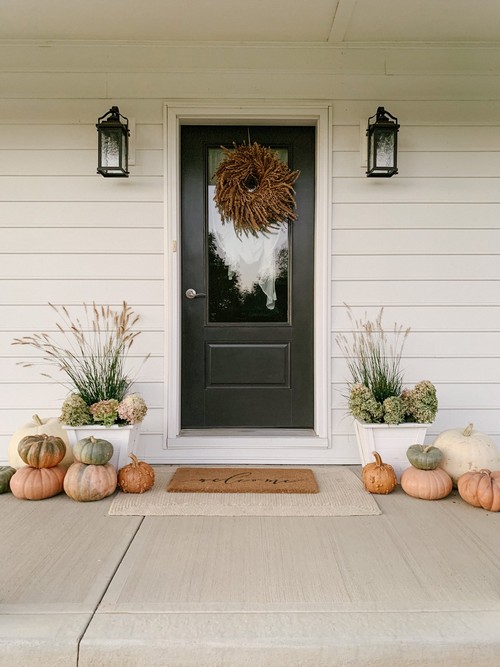 Fall porch with dried hydrangeas and grass